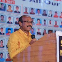 Director sir delivering keynote speech during testimonial event Director sir giving keynote speech – testimonials at Hyderabad best coaching
