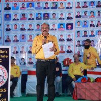 Director delivering motivational speech during testimonial event Director giving speech – testimonials at Hyderabad best coaching
