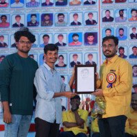 Maths faculty honors student achievement during testimonial event Maths faculty giving award to student – testimonials at Hyderabad best coaching