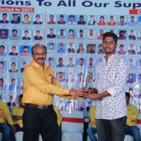 Director Srinivasulu Reddy Sir awarding a student during the testimonials ceremony at Everest Coaching Point. Director Sir giving award to student during testimonials event at Everest Coaching Point