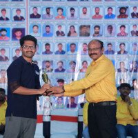 Director Srinivasulu Reddy Sir awarding a student during the testimonials event at Everest Coaching Point. Director Srinivasulu Reddy Sir giving award to student during testimonials event at Everest Coaching Point