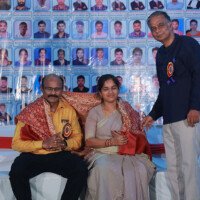 A student presents a shawl to Srinivasulu Reddy Sir as a gesture of respect during our testimonials event. Student giving shawl to Director Srinivasulu Reddy during testimonials ceremony at Everest Coaching Point