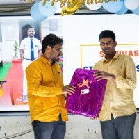Everest Coaching Point faculty presenting an award Faculty giving award – testimonials of recognition and success
