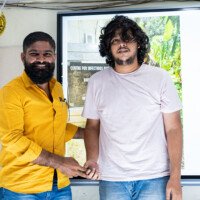 Rathod Sir of Everest Coaching Point giving award to a student Rathod Sir presenting award to student – testimonials of excellence