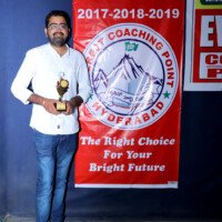 Testimonial – Student with Award and Government Job Success Successful job holder student testimonial – Standing with award at Everest Coaching Point