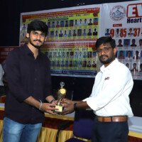 Faculty member presenting an award to a successful student Faculty giving award to student – testimonials of encouragement and success