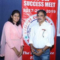 Everest Coaching Point faculty with student who achieved job success Faculty with successful student – testimonials of job success and coaching excellence