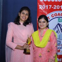 Award-winning students of Everest Coaching Point celebrating in the streets Students with awards in street rally – testimonials of achievement and pride